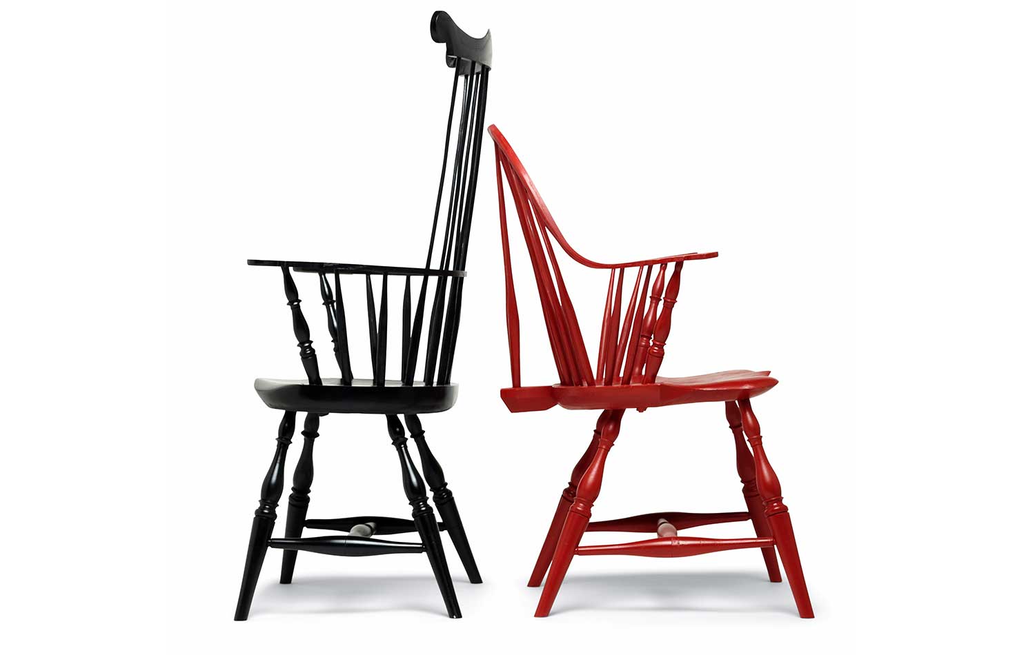 black comb-back red sack back Windsor chairs
